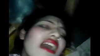 Indian woman in traditional dress enjoys intense sexual encounter.